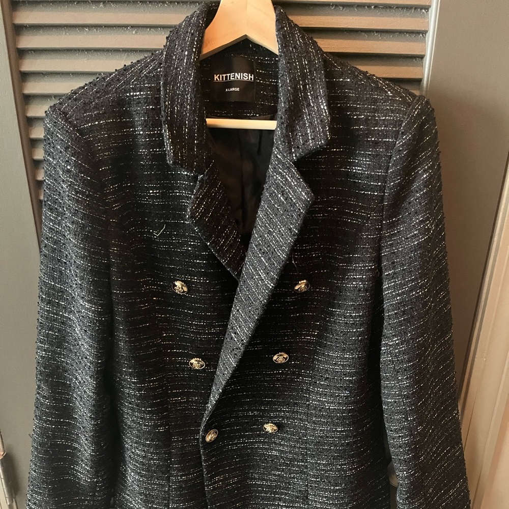 Kittenish suit jacket never worn